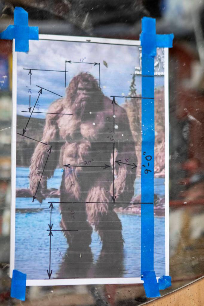 Measurements for a giant Bigfoot creation made by Terry Carrigan, 60, at his home-based Skywater Studios on Sunday, April 14, 2024 in Monroe, Washington. (Annie Barker / The Herald)