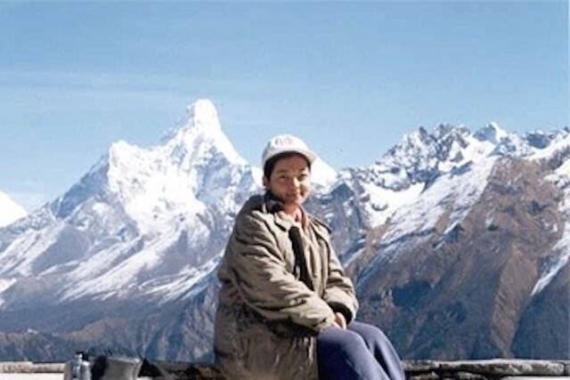 Binita Shrestha in 1997 at Shyangboche village. The mountain behind her is Ama Dablam. (Provided by Binita Shrestha)