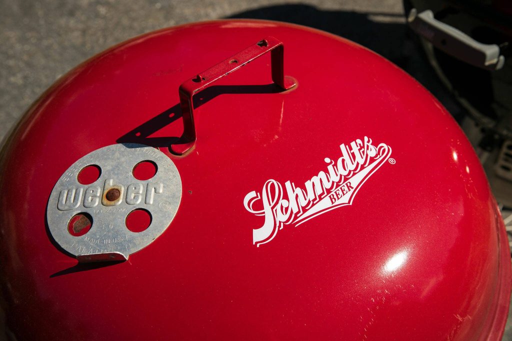 Each one of Jimmer De Groots grills is unique, including a Schmidts Beer branded one. (Ryan Berry / The Herald)