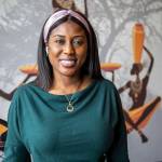 Owner Fatou Dibba poses for a photo at the African Heritage Restaurant on Saturday, April 6, 2024 in Everett, Washington. (Annie Barker / The Herald)