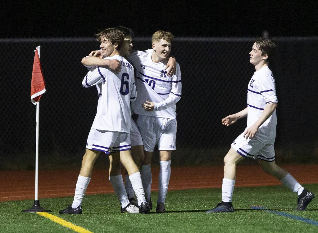 Kamiak players run over to congratulate Kaloyan Iliev on his goal during the game against Glacier Peak on Monday, April 1, 2024 in Snohomish, Washington. (Olivia Vanni / The Herald)