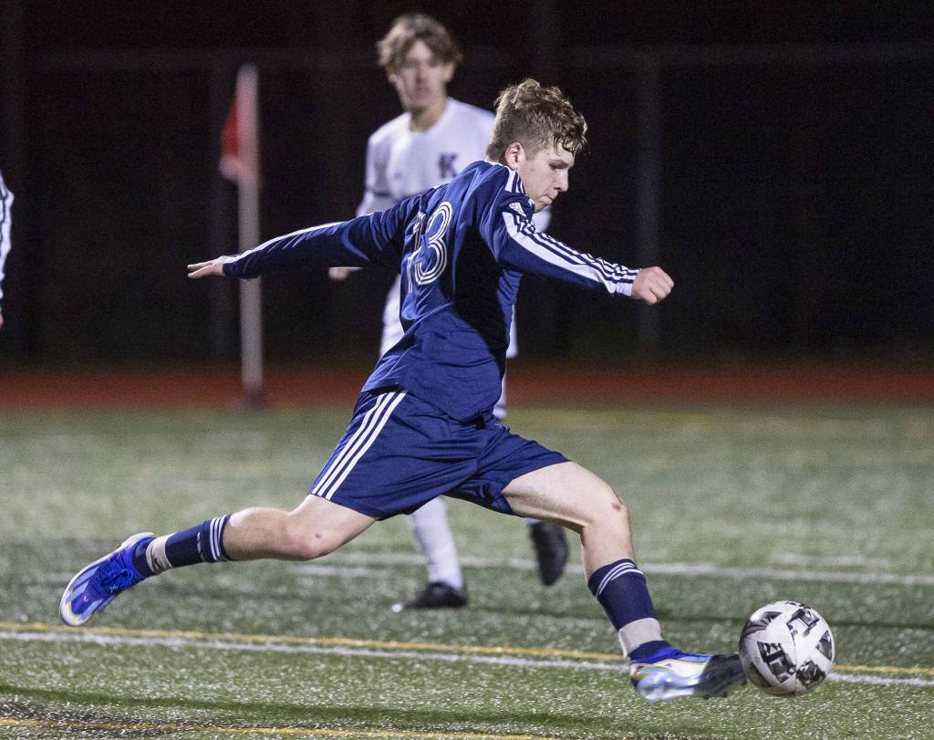 Glacier Peaks Tyler Larsen takes a shot on goal during the game against Kamiak on Monday, April 1, 2024 in Snohomish, Washington. (Olivia Vanni / The Herald)