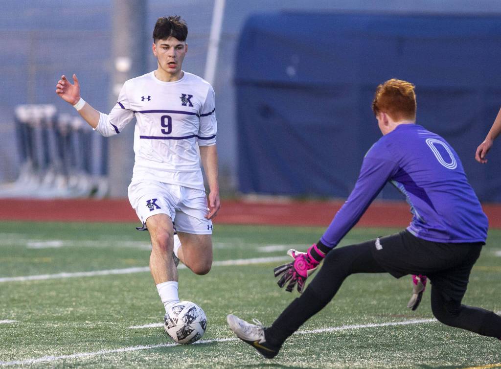 Glacier Peaks Aiden Larsen comes out to block a shot attempt by Kamiaks Kaloyan Iliev during the game on Monday, April 1, 2024 in Snohomish, Washington. (Olivia Vanni / The Herald)