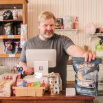 Owner Andy Plumlee in Popsies in Oak Harbor. (Photo provided by Whidbey News-Times)