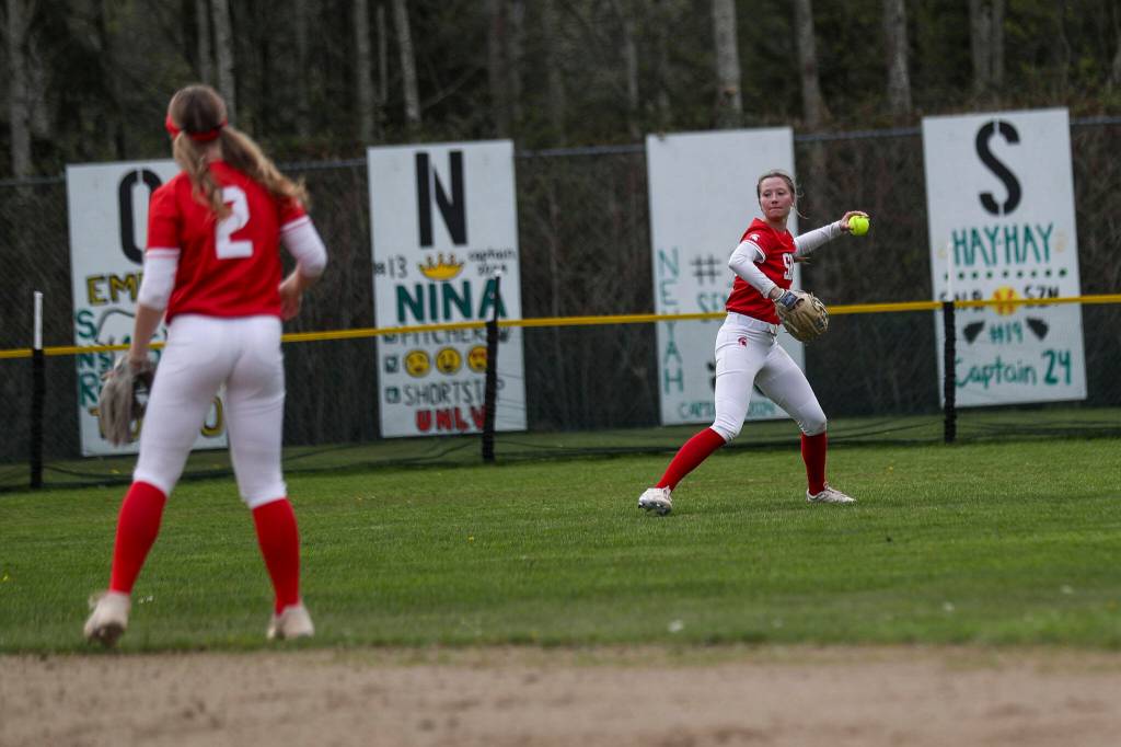 Stanwoods Reagan Ryan (25) throws the ball during a prep softball game between Stanwood and Jackson at Henry M. Jackson High School on Tuesday, April 2, 2024 in Mill Creek, Washington. Jackson won, 6-0. (Annie Barker / The Herald)
