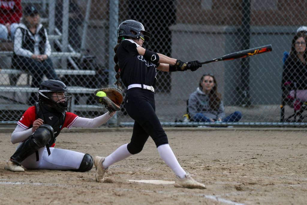 Jacksons Reese Westman (2) swings during a prep softball game between Stanwood and Jackson at Henry M. Jackson High School on Tuesday, April 2, 2024 in Mill Creek, Washington. Jackson won, 6-0. (Annie Barker / The Herald)