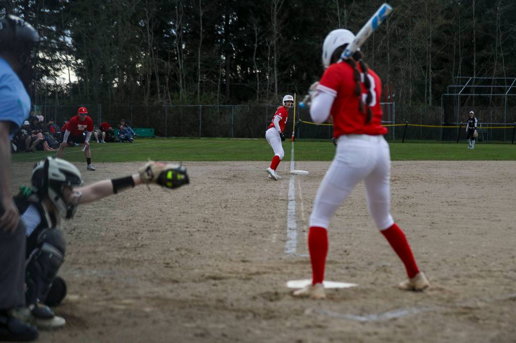 Stanwoods Madilynn Rel (22) waits on third during a prep softball game between Stanwood and Jackson at Henry M. Jackson High School on Tuesday, April 2, 2024 in Mill Creek, Washington. Jackson won, 6-0. (Annie Barker / The Herald)