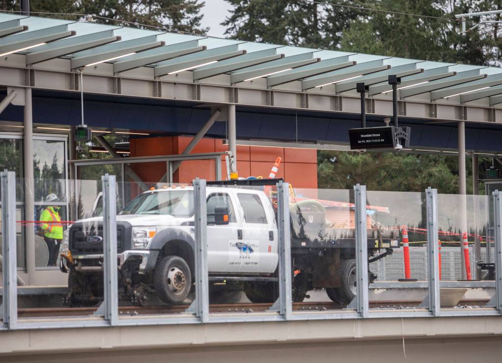 A work truck sits on the tracks at the Mountlake Terrace Light Rail station on Thursday, April 4, 2024 in Mountlake Terrace, Washington. (Olivia Vanni / The Herald)
A work truck is visible on the tracks at the Mountlake Terrace Light Rail station on Thursday, April 4, 2024 in Mountlake Terrace, Washington. (Olivia Vanni / The Herald)