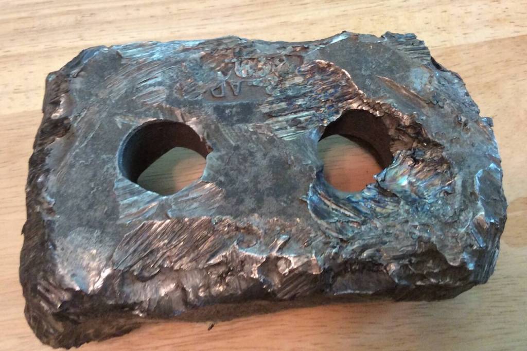 A five-inch metal piece from a tub grinder fell about 20 feet away from Lisa Janssons sons in 2016 when they were fixing up a car in the familys driveway. (Photo provided by Lisa Jansson)