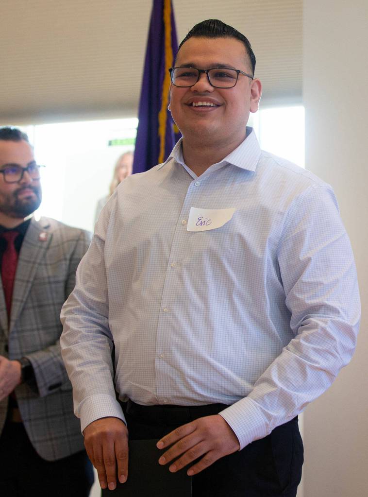 Finalist Eric Jimenez steps forward for recognition during the 2024 Snohomish County Emerging Leaders Awards Presentation on Wednesday, April 17, 2024, in Everett, Washington. (Ryan Berry / The Herald)