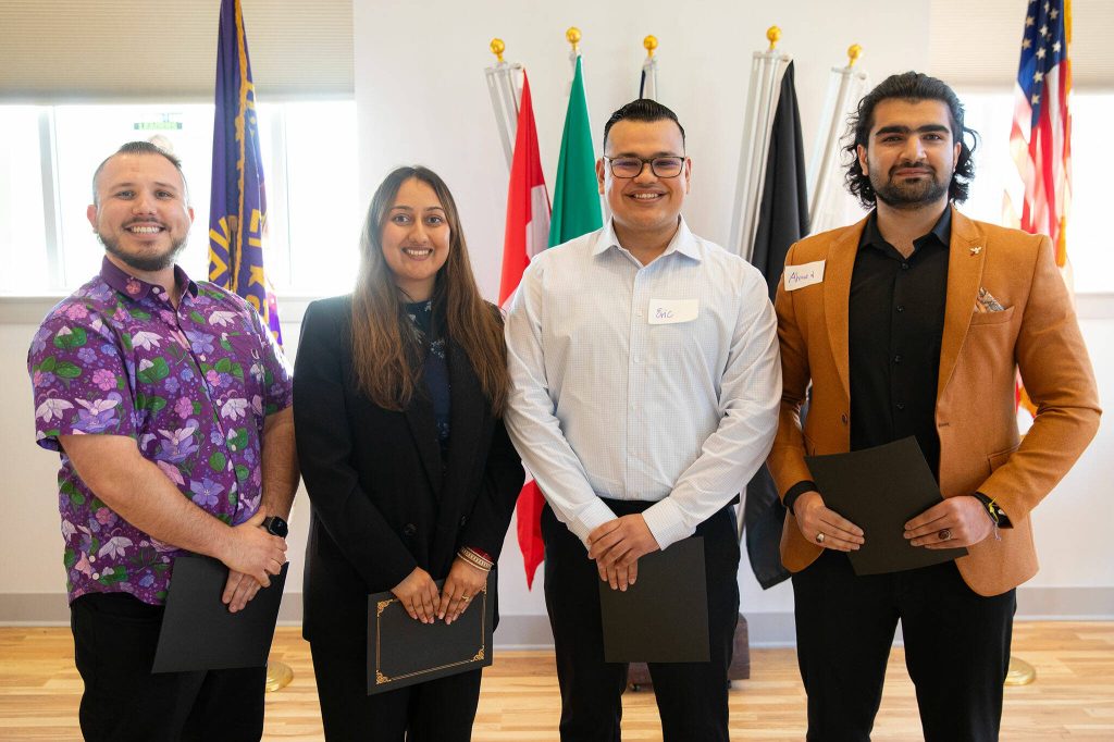 Nathanael Engen, Simreet Dhaliwal, Eric Jimenez and Ahmad Hilal Abid make up the top 4 during the 2024 Snohomish County Emerging Leaders Awards Presentation on Wednesday, April 17, 2024, in Everett, Washington. (Ryan Berry / The Herald)