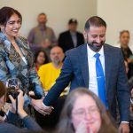 Dr. Baljinder S. Gill and Lavleen Samra-Gill head up to the front of the room after being named winners of the inaugural Emerging BNusiness Award during the 2024 Snohomish County Emerging Leaders Awards Presentation on Wednesday, April 17, 2024, in Everett, Washington. (Ryan Berry / The Herald)