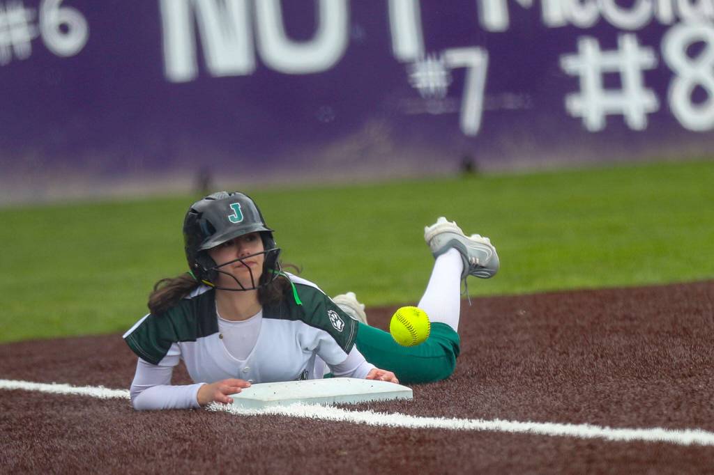 Jacksons Addi Bale (3) slides into third during a 4A softball game between Kamiak and Jackson at Kamiak High School on Tuesday, April 9, 2024 in Mukilteo, Washington. Jackson won, 9-0. (Annie Barker / The Herald)