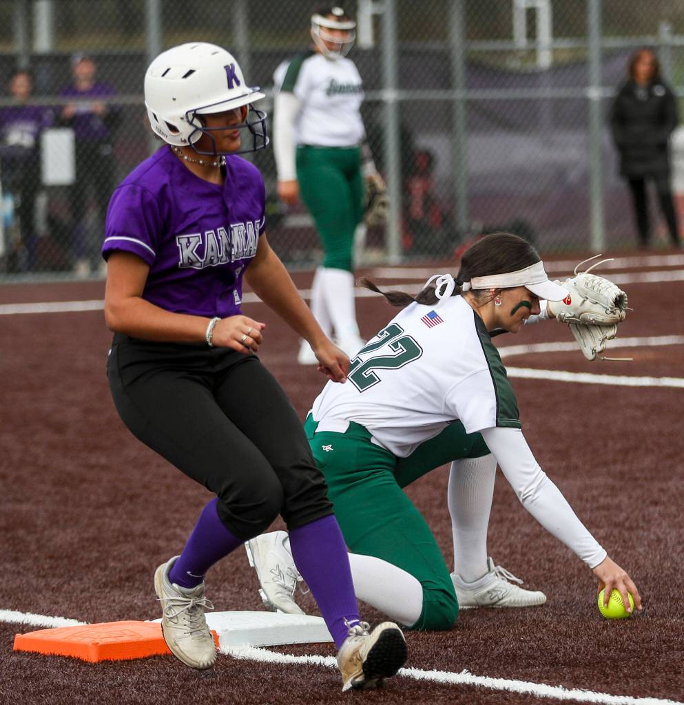 Kamiaks Synclair Mawudeku (2) makes it to first during a 4A softball game between Kamiak and Jackson at Kamiak High School on Tuesday, April 9, 2024 in Mukilteo, Washington. Jackson won, 9-0. (Annie Barker / The Herald)