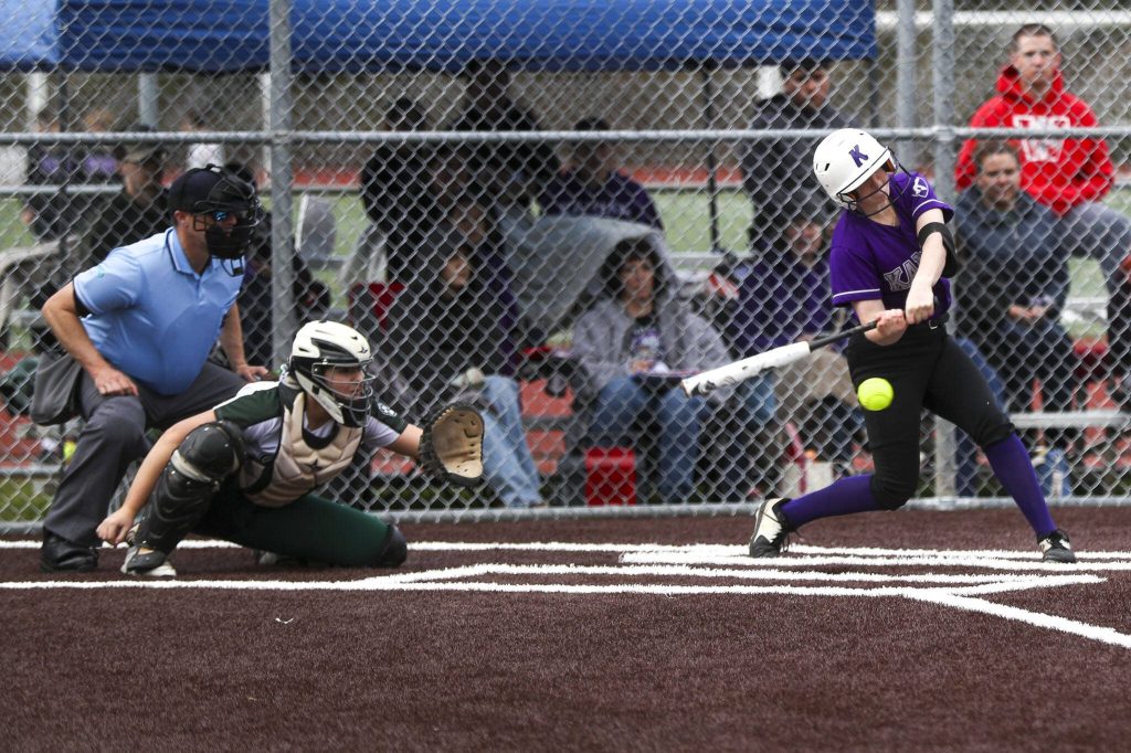 Kamiaks Kylie McClure (8) swings during a 4A softball game between Kamiak and Jackson at Kamiak High School on Tuesday, April 9, 2024 in Mukilteo, Washington. Jackson won, 9-0. (Annie Barker / The Herald)