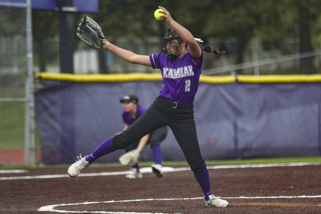 Kamiaks Synclair Mawudeku (2) pitches during a 4A softball game between Kamiak and Jackson at Kamiak High School on Tuesday, April 9, 2024 in Mukilteo, Washington. Jackson won, 9-0. (Annie Barker / The Herald)