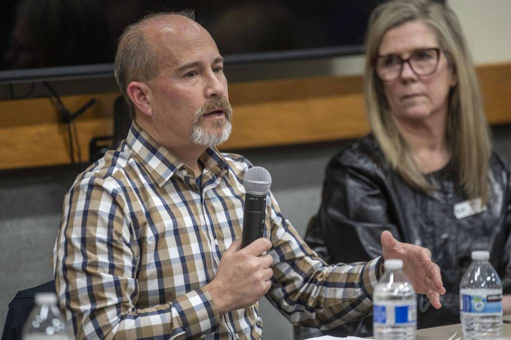 Dan Templeman, the retired Everett police chief and new senior executive in the mayors office, speaks during a homelessness forum sponsored by The Daily Herald at the Mukilteo Library on Thursday, April 11, 2024, in Mukilteo, Washington. (Annie Barker / The Herald)