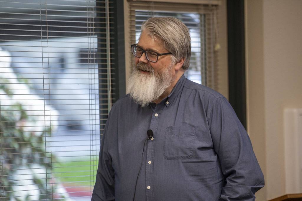 Jon Bauer, opinion editor for The Herald, speaks during a homelessness forum sponsored by The Daily Herald at the Mukilteo Library on Thursday, April 11, 2024, in Mukilteo, Washington. (Annie Barker / The Herald)