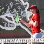 Snohomishs Morgan Gibson returns the ball in her match against Stanwoods Ryann Reep on Friday, April 12, 2024 in Snohomish, Washington. Gibson lost the first set 4-6 but rallied back to win 6-2 in the second and 6-0 in the third. The Panthers bested the Spartans 5-2. (Taras McCurdie / The Herald)