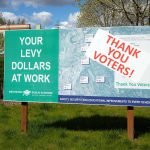 A sign thanks Arlington voters for approving a 2020 levy on Tuesday, April 16, 2024, in Arlington, Washington. (Ryan Berry / The Herald)