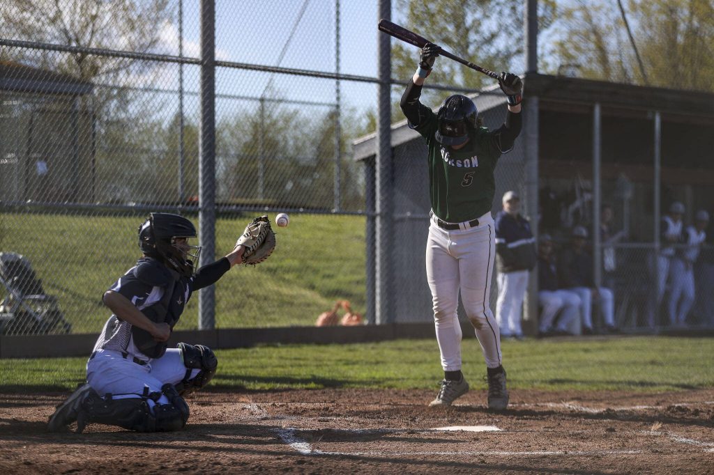 Jacksons Gavin Clark (5) dodges a ball during a baseball game between Jackson and Glacier Peak at Glacier Peak High School on Tuesday, April 16, 2024 in Snohomish, Washington. Glacier Peak won 3-0. (Annie Barker / The Herald)