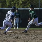 Glacier Peaks Lucas Entler (25) dives for second during a baseball game between Jackson and Glacier Peak at Glacier Peak High School on Tuesday, April 16, 2024 in Snohomish, Washington. Glacier Peak won 3-0. (Annie Barker / The Herald)