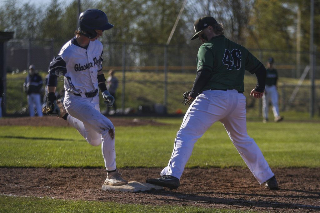 Jacksons Sam Craig (46) gets an out at first during a baseball game between Jackson and Glacier Peak at Glacier Peak High School on Tuesday, April 16, 2024 in Snohomish, Washington. Glacier Peak won, 3-0. (Annie Barker / The Herald)