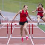 Mountlake Terraces Brynlee Dubiel reacts to her time after crossing the finish line in the girls 300-meter hurdles during the Eason Invitational at Snohomish High School on Saturday, April 20, 2024 in Snohomish, Washington. Dubiel placed fourth with a time of 46.85 seconds. (Olivia Vanni / The Herald)