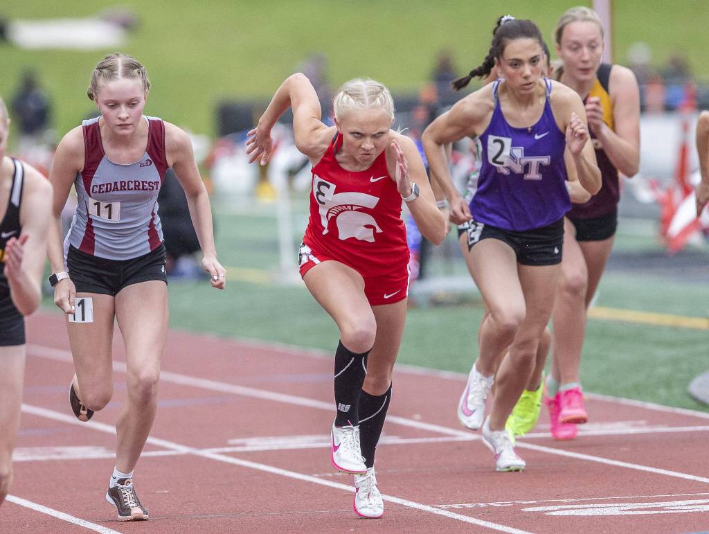 Stanwoods Mary Andelin takes off from the starting line in the girls 800 meters during the Eason Invitational at Snohomish High School on Saturday, April 20, 2024 in Snohomish, Washington. (Olivia Vanni / The Herald)