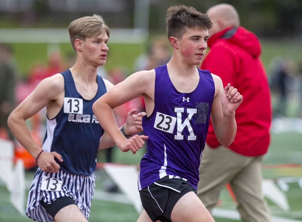 Kamiaks Cole Henriksen runs in the boys 3,200 meters followed by Glacier Peaks Mason Strasser during the Eason Invitational at Snohomish High School on Saturday, April 20, 2024 in Snohomish, Washington. (Olivia Vanni / The Herald)