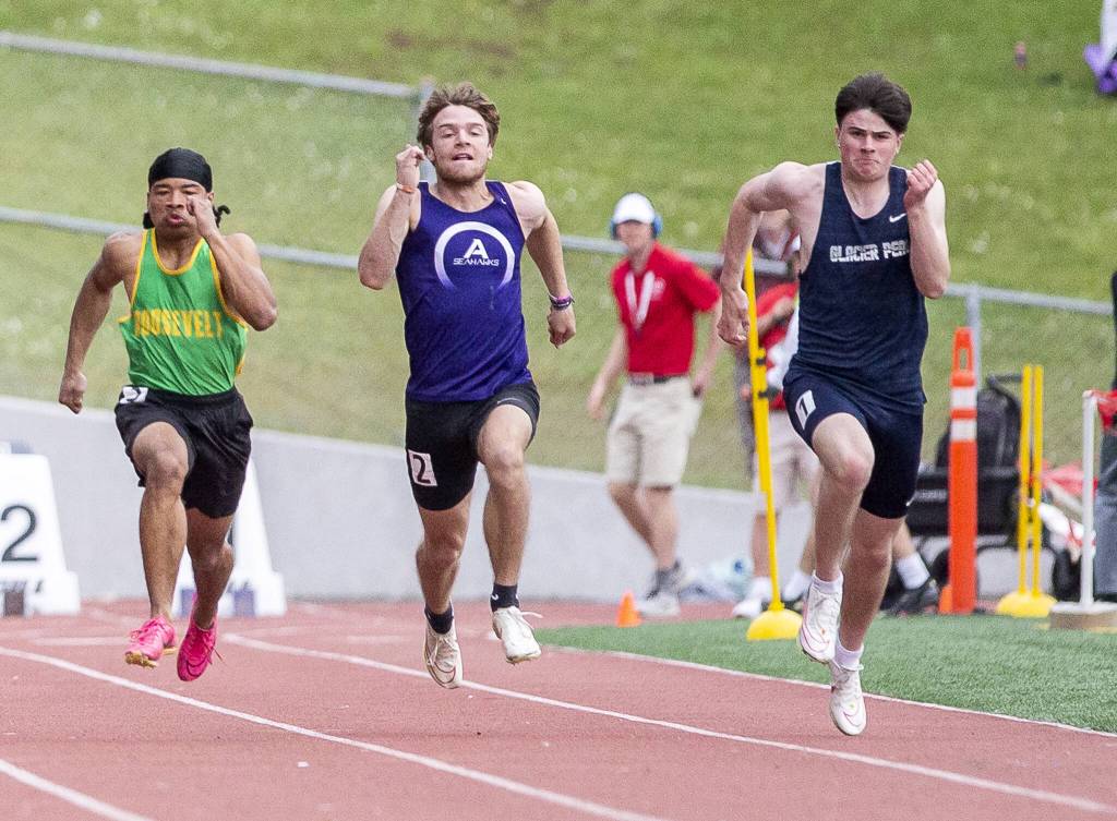 Glacier Peaks Mateo Ganje runs in the boys 100 meter during the Eason Invitational at Snohomish High School on Saturday, April 20, 2024 in Snohomish, Washington. Ganje placed second with a time of 10.63 seconds. (Olivia Vanni / The Herald)