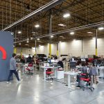 magniX employees and staff have moved into the companys new 40,000 square foot office on Seaway Boulevard on Monday, Jan. 18, 2020 in Everett, Washington. magniX consolidated all of its Australia and Redmond operations under one roof to be home to the global headquarters, engineering, manufacturing and testing of its electric propulsion systems. (Andy Bronson / The Herald)