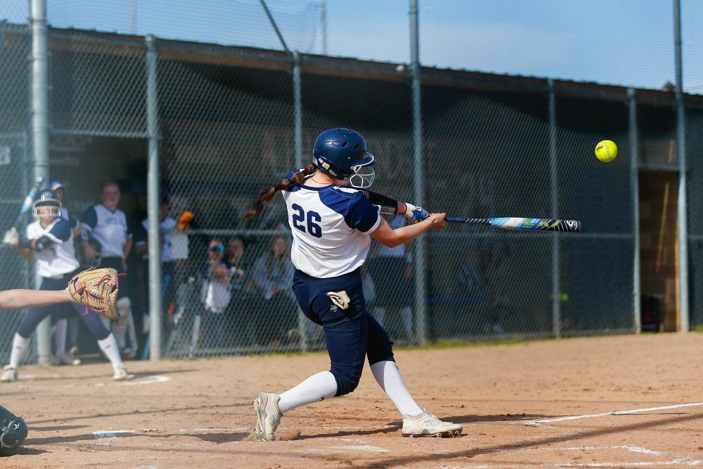 Glacier Peaks Lauren Hufford makes contact with a pitch against Lake Stevens on Tuesday, April 23, 2024, at Glacier Peak High School in Snohomish, Washington. (Ryan Berry / The Herald)