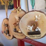 Artist Libby Hammer creates scenes inspired by her own life using bits and pieces of rocks and shells she finds while beachcombing on Whidbey Island. (Sam Fletcher / Whidbey News-Times)