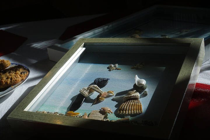 Artist Libby Hammer sees something more in the rocks and shells and pieces of sea glass that collect on Whidbey Island beaches. (Sam Fletcher / Whidbey News-Times)