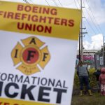 Members of Boeings firefighter union and supporters hold an informational picket at Airport Road and Kasch Park Road on Monday, April 29, 2024 in Everett, Washington. (Annie Barker / The Herald)