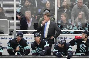 FILE - Seattle Kraken head coach Dave Hakstol looks on from the bench against the Colorado Avalanche during the third period of Game 4 of an NHL hockey Stanley Cup first-round playoff series Monday, April 24, 2023, in Seattle. The Seattle Kraken fired coach Dave Hakstol on Monday, April 29, 2024, after the third-year franchise took a significant step back following a playoff appearance in their second season.(AP Photo/Lindsey Wasson, File)