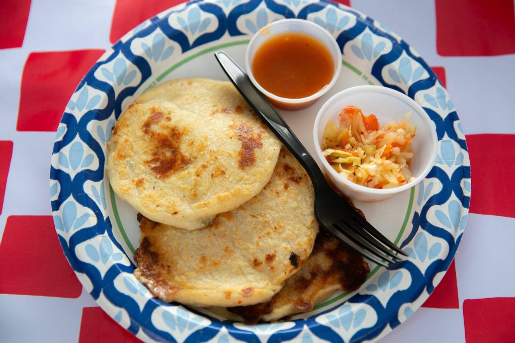 Ten dollars gets visitors three fresh pupusas at the Hidden Gems Weekend Market on Sunday, April 28, 2024, at Boom City in Tulalip, Washington. (Ryan Berry / The Herald)