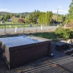 The grave of the original owner of the home is located next to the property. (Olivia Vanni / The Herald)