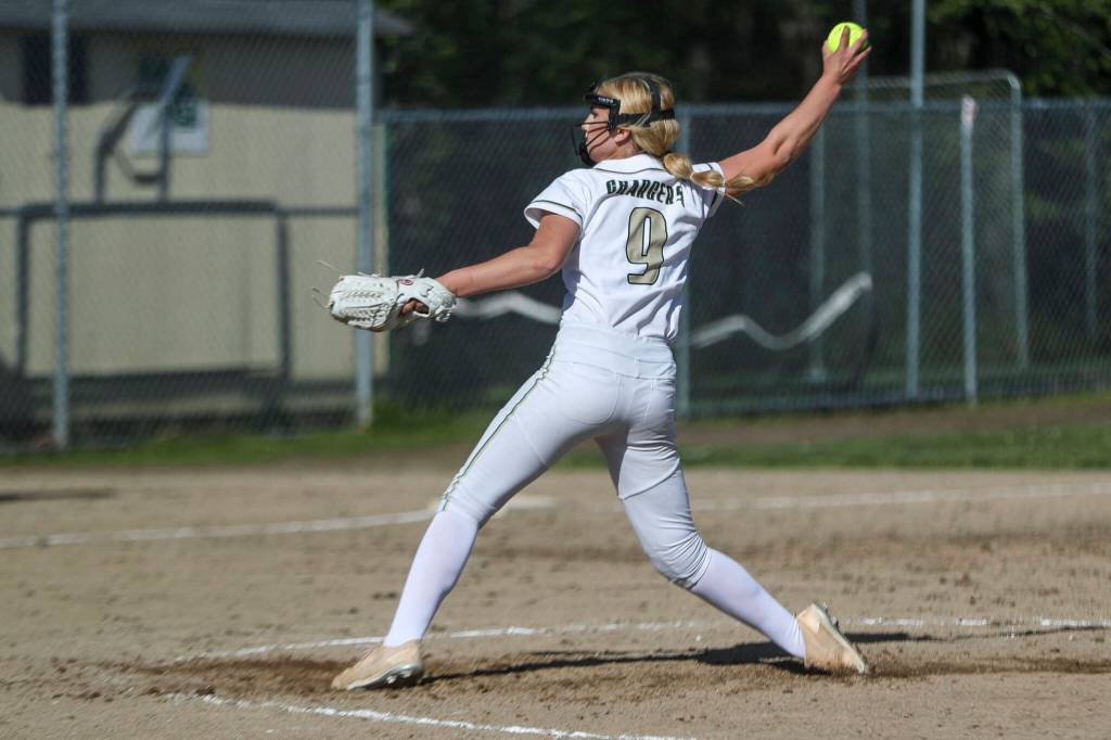 Marysville Getchells Aaliyah Shafer (9) pitches during a softball game between Meadowdale and Marysville Getchell on Wednesday, May 1, 2024 in Marysville, Washington. Meadowdale won, 12-9. (Annie Barker / The Herald)