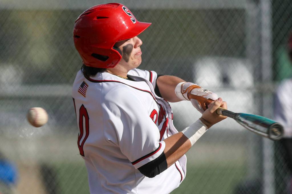 Snohomishs Enzo Porletto (10) swings during a District 1 3A baseball game between Meadowdale and Snohomish at Snohomish High School on Monday, April 30, 2024 in Snohomish, Washington. Snohomish won, 3-1. (Annie Barker / The Herald)