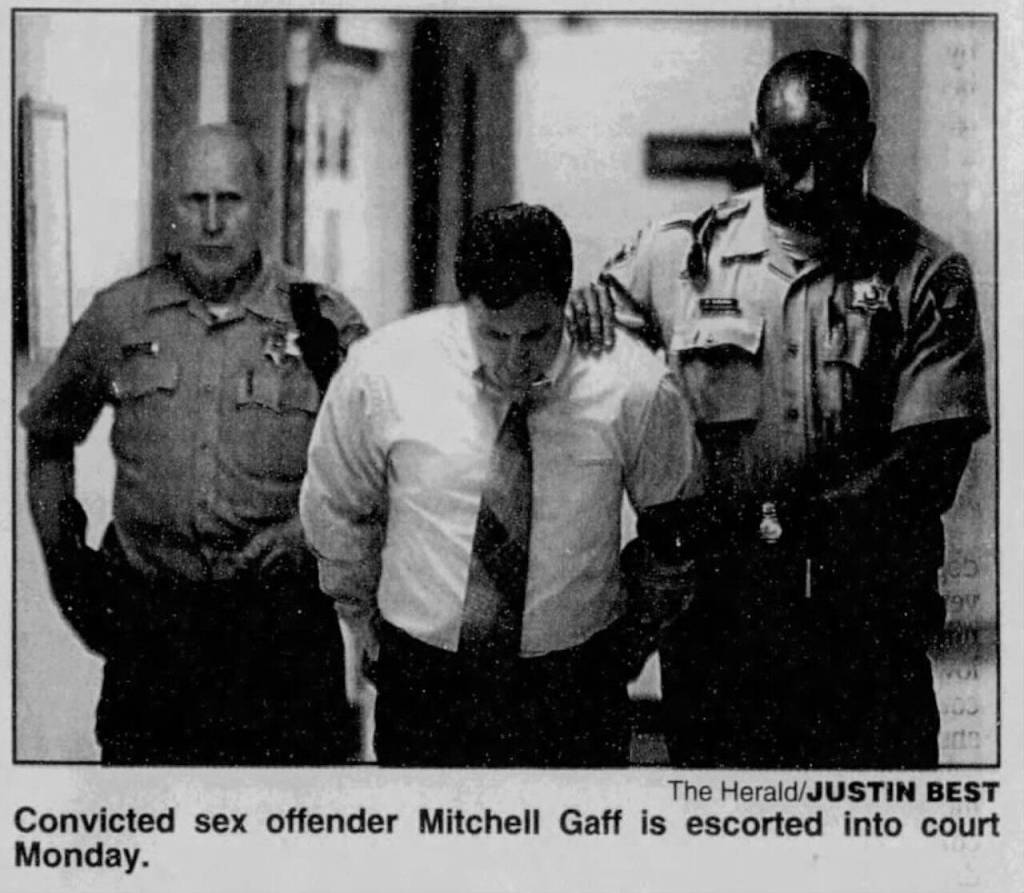 Convicted sex offender Michell Gaff is escorted into court. This photo originally appeared in The Everett Daily Herald on Aug. 15, 2000. (Justin Best / The Herald file)