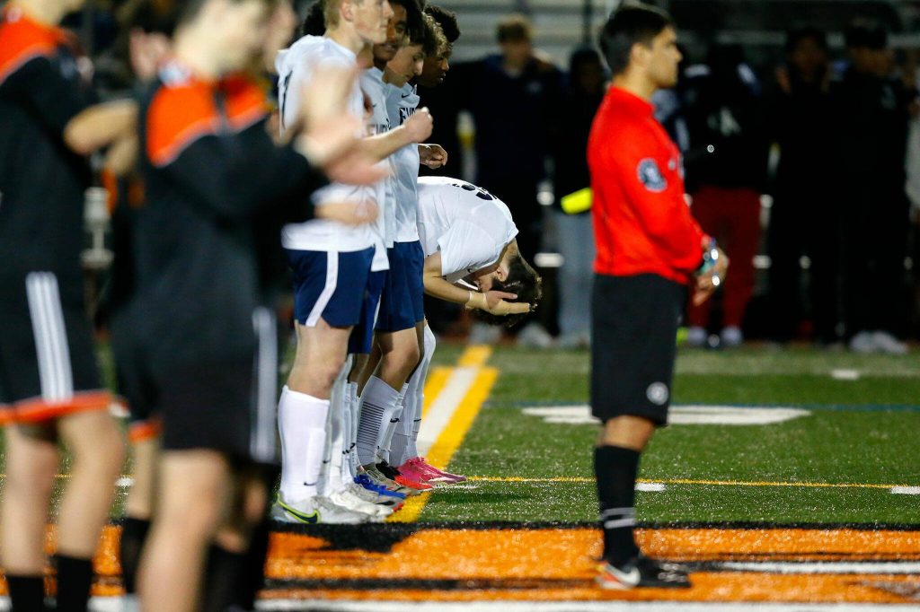 Everetts squad reacts as they fall behind in penalty kicks during a 3A District soccer match against Monroe on Thursday, May 2, 2024, at Monroe High School in Monroe, Washington. (Ryan Berry / The Herald)