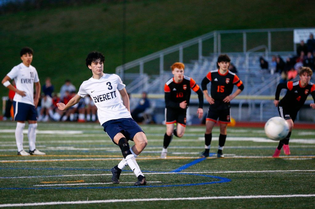 Everetts Stephen Post puts a late penalty kick in the back of the next to send a 3A District soccer match against Monroe to extra time on Thursday, May 2, 2024, at Monroe High School in Monroe, Washington. (Ryan Berry / The Herald)