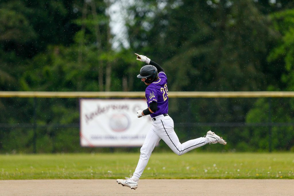 Lake Stevens Trey Nance does himself a favor with a two-run home run during a playoff loss to Bothell on Saturday, May 4, 2024, in Lake Stevens, Washington. (Ryan Berry / The Herald)
