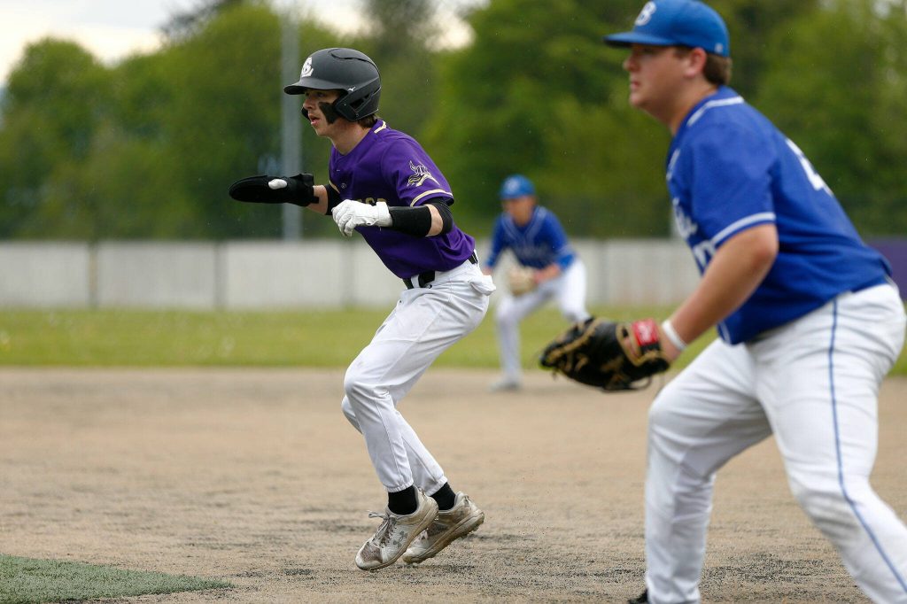 Lake Stevens Caleb Tilford takes a secondary lead during a playoff loss to Bothell on Saturday, May 4, 2024, in Lake Stevens, Washington. (Ryan Berry / The Herald)