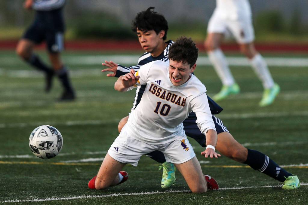 Issaquahs Oliver Dorr (10) scrambles for the ball during a Class 4A District 1/2 boys soccer game between Glacier Peak and Issaquah at Glacier Peak High School in Snohomish, Washington on Tuesday, May 7, 2024. Issaquah won, 2-1. (Annie Barker / The Herald)