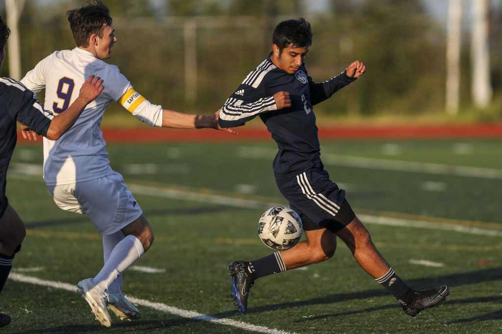 Glacier Peaks Gael Guerrero (2) kicks the ball during a Class 4A District 1/2 boys soccer game between Glacier Peak and Issaquah at Glacier Peak High School in Snohomish, Washington on Tuesday, May 7, 2024. Issaquah won, 2-1. (Annie Barker / The Herald)