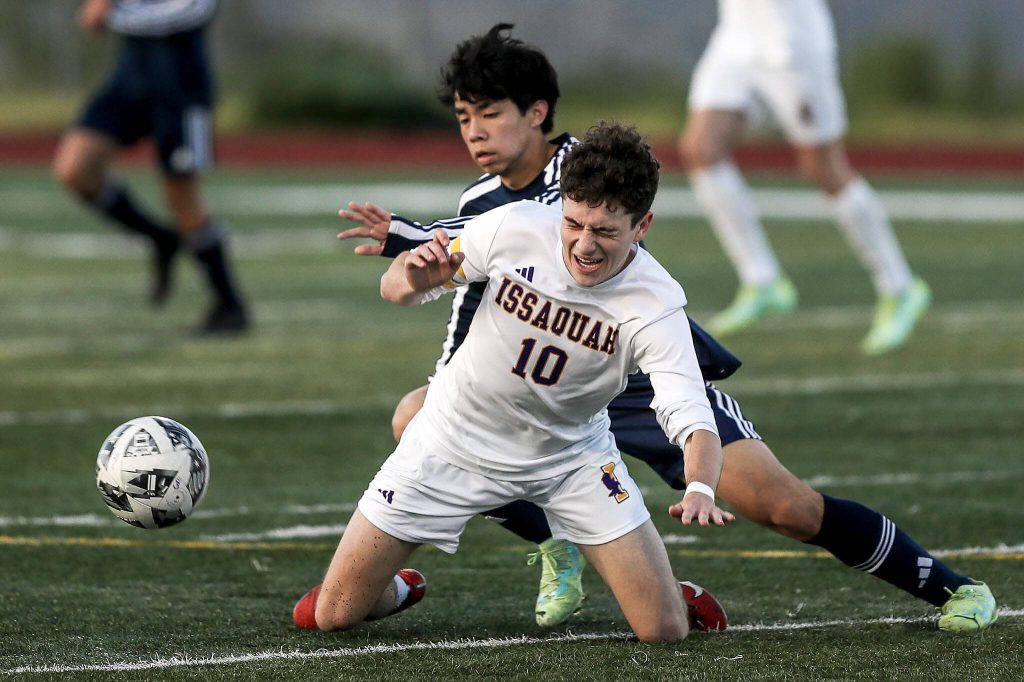 Issaquahs Oliver Dorr (10) scrambles for the ball during a Class 4A District 1/2 boys soccer game between Glacier Peak and Issaquah at Glacier Peak High School in Snohomish, Washington on Tuesday, May 7, 2024. Issaquah won, 2-1. (Annie Barker / The Herald)