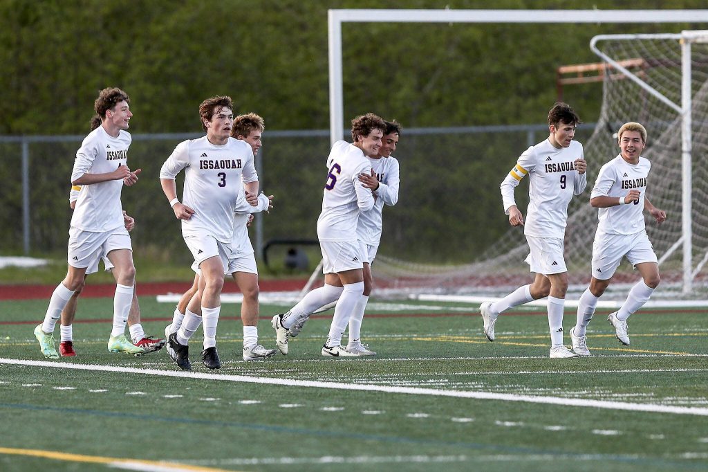 Issaquah players celebrate during a Class 4A District 1/2 boys soccer game between Glacier Peak and Issaquah at Glacier Peak High School in Snohomish, Washington on Tuesday, May 7, 2024. Issaquah won, 2-1. (Annie Barker / The Herald)